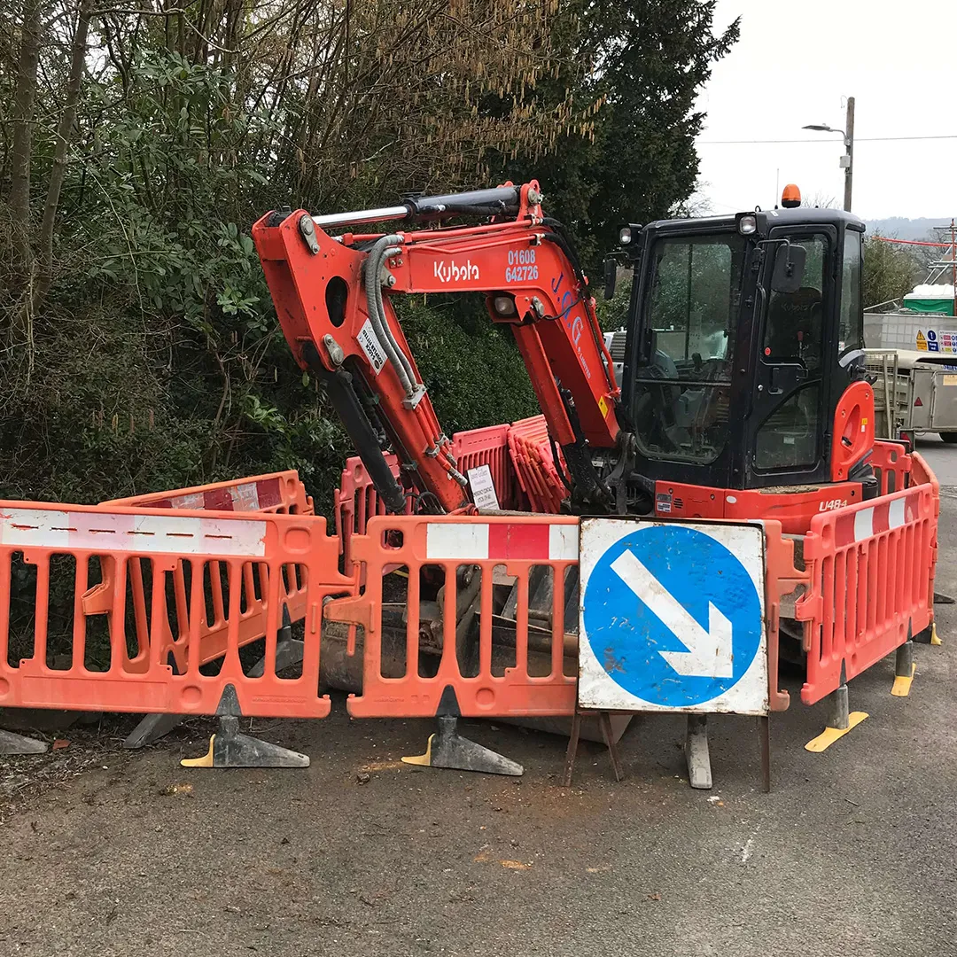 a construction vehicle is parked in a parking lot