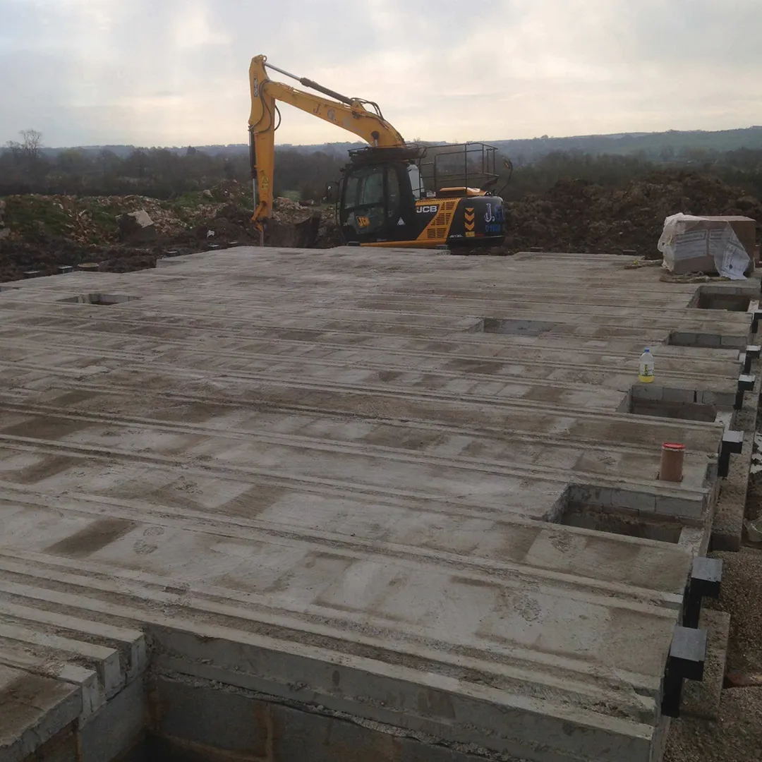 a construction site with a bulldozer in the background