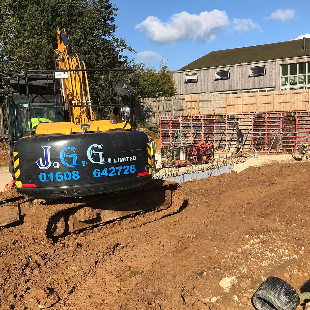 a construction site with a bulldozer and construction equipment